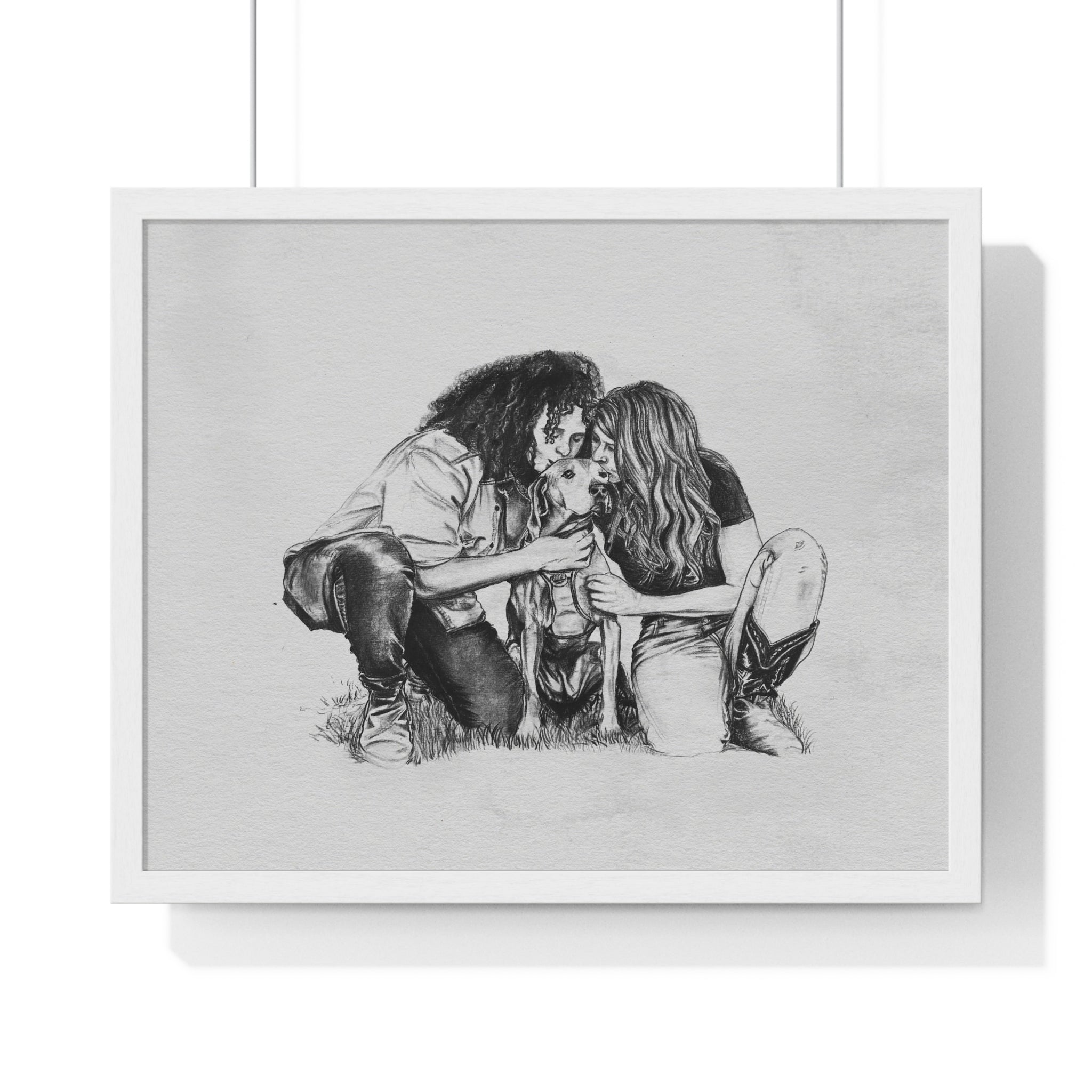 Framed black and white drawing of a couple.