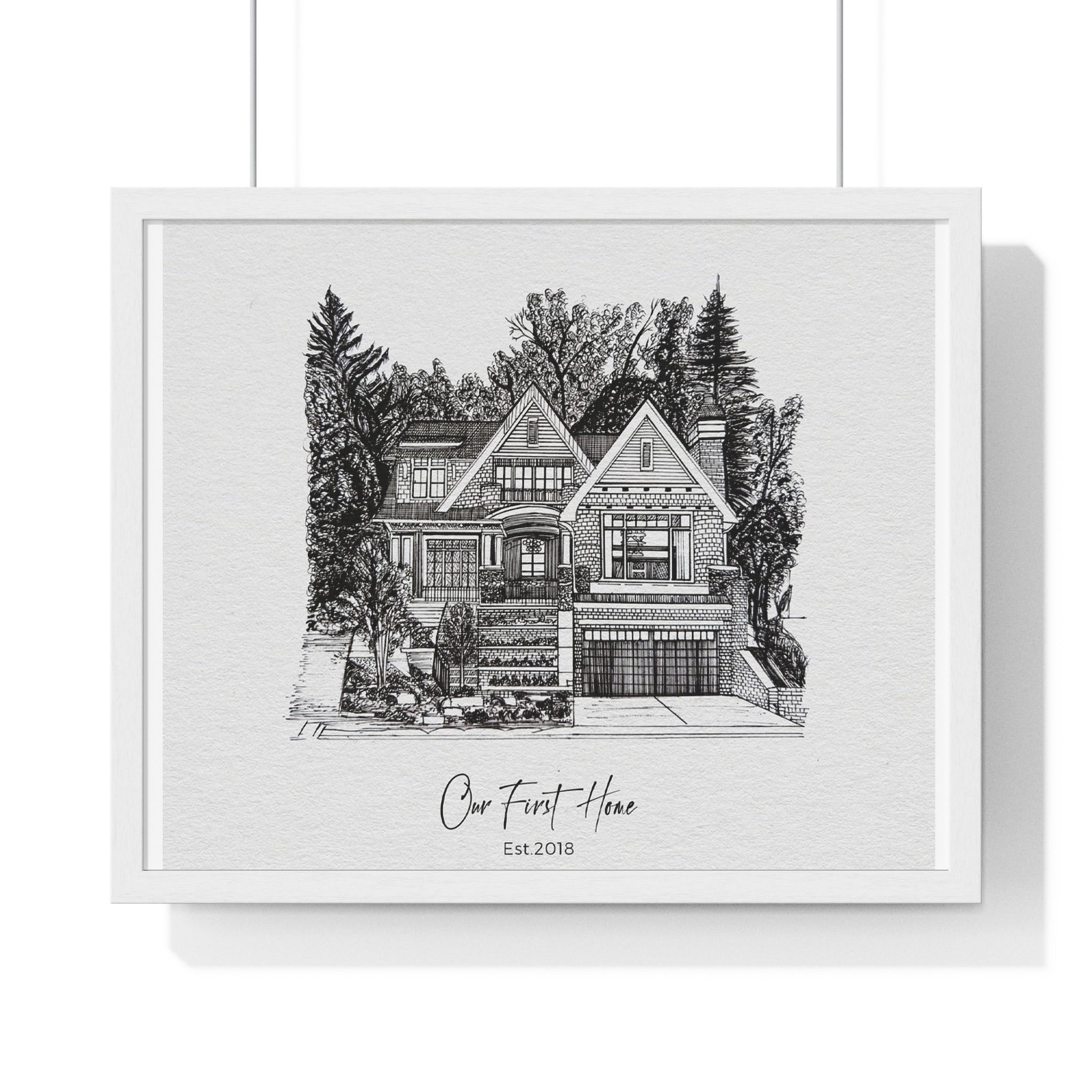 Framed black and white illustration of a house.