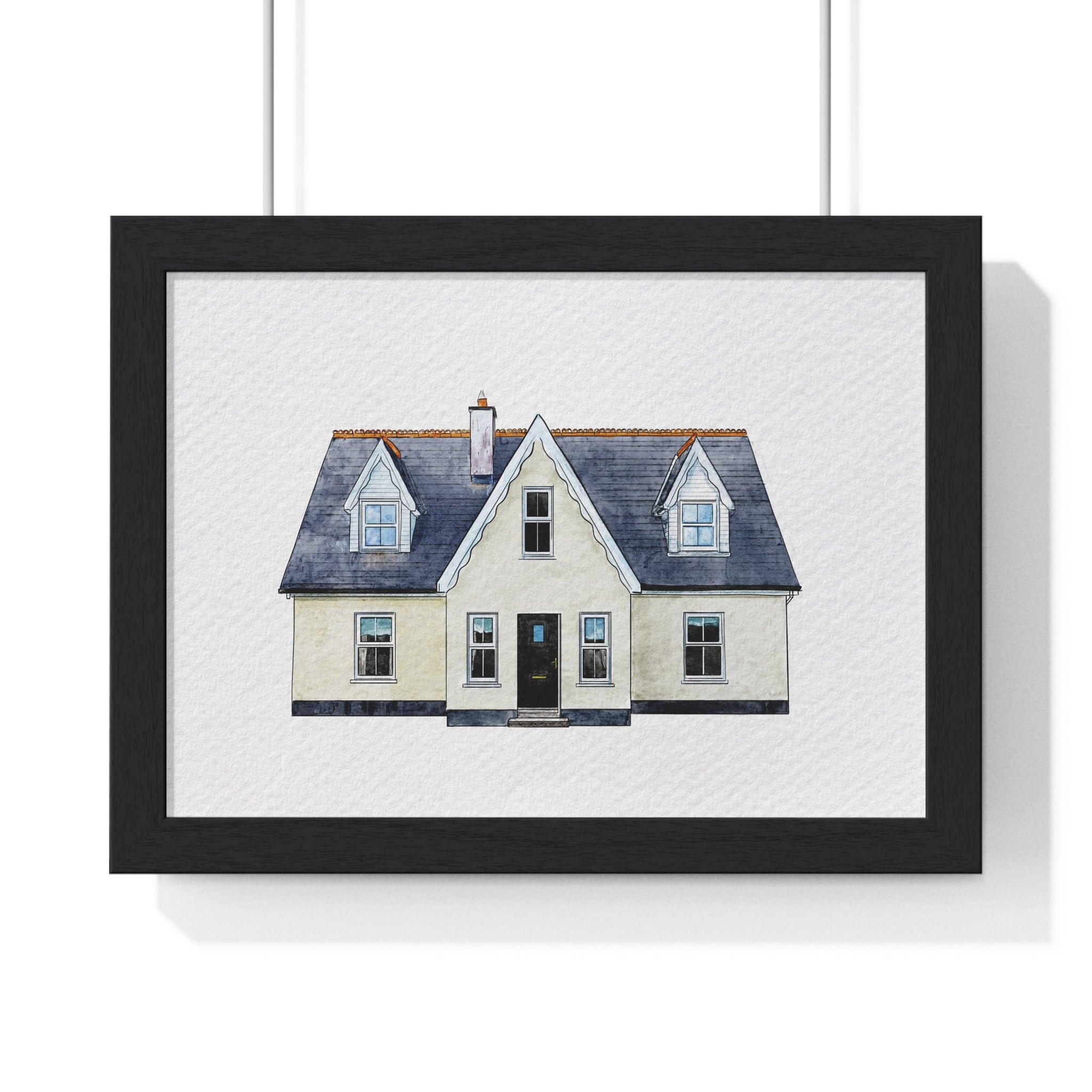 Watercolor framed artwork of a house.